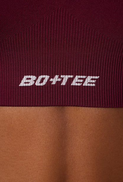 Super Sculpt Seamless Cross Back Sports Bra in Plum
