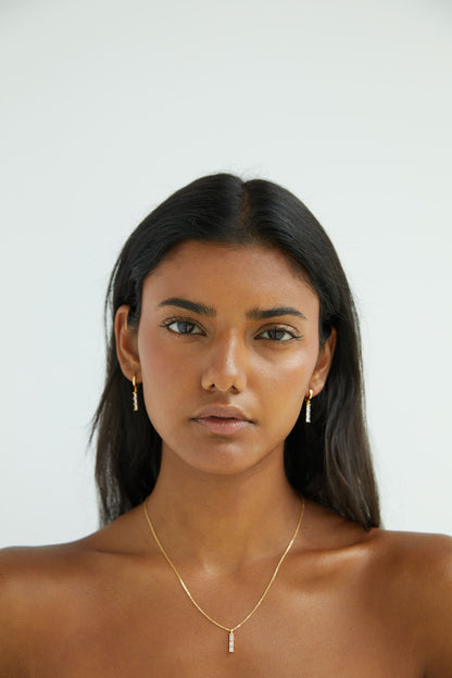HOOP EARRING WITH STONED BAR PENDANT