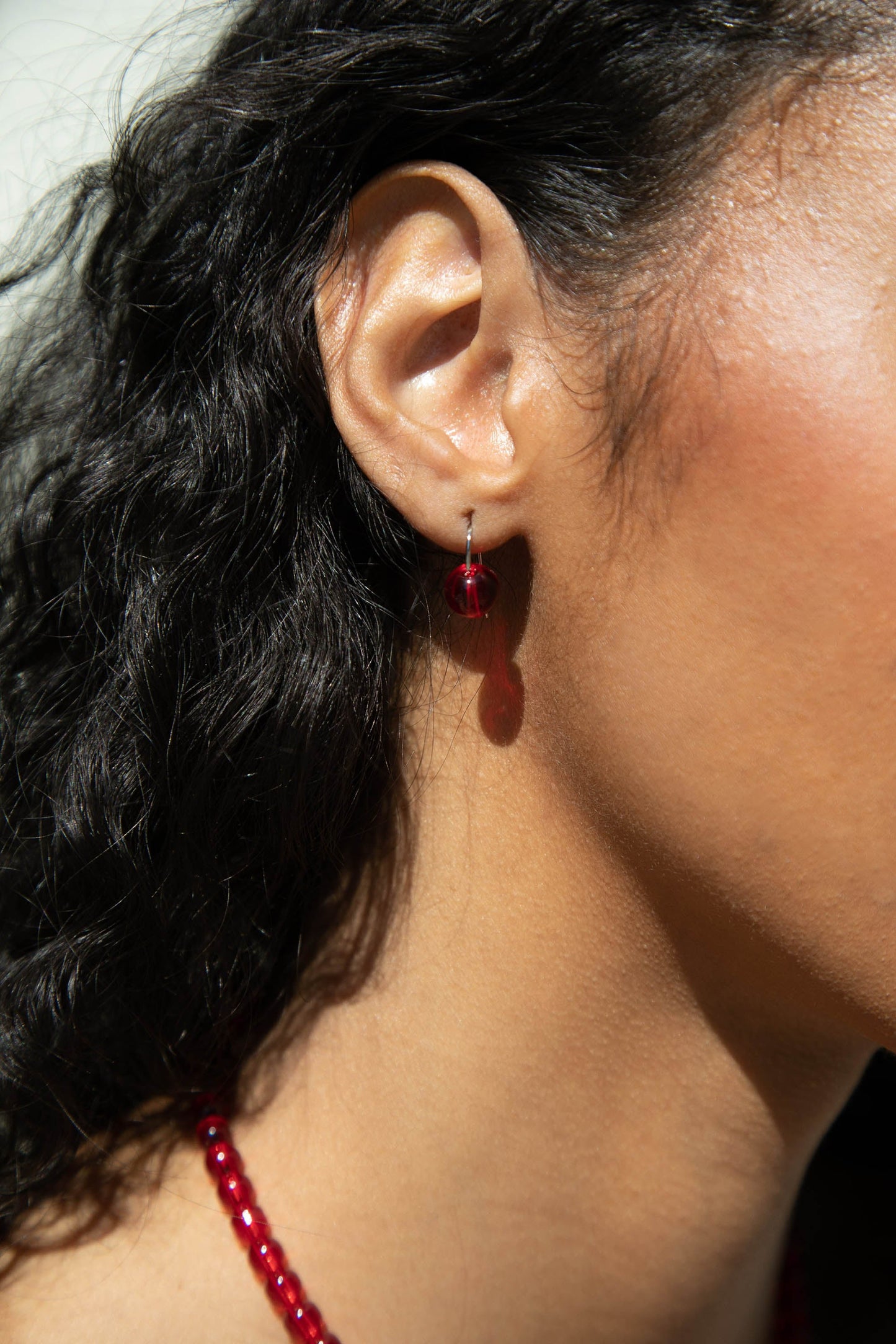 RED BEAD HOOP EARRING